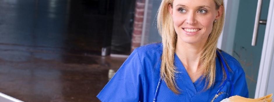 Nurse using an EHR on a lapop